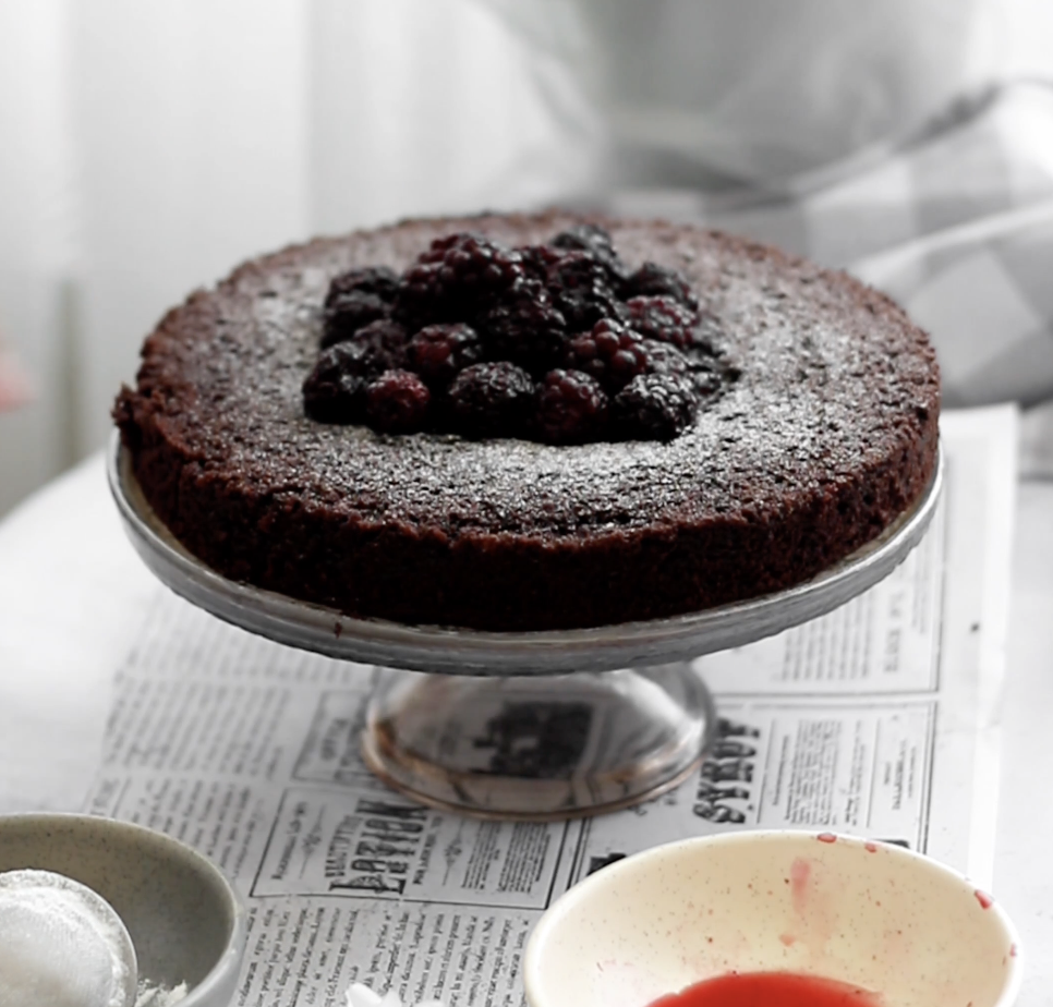 Decadent Baked Chocolate Cake with Mixed Berry Topping