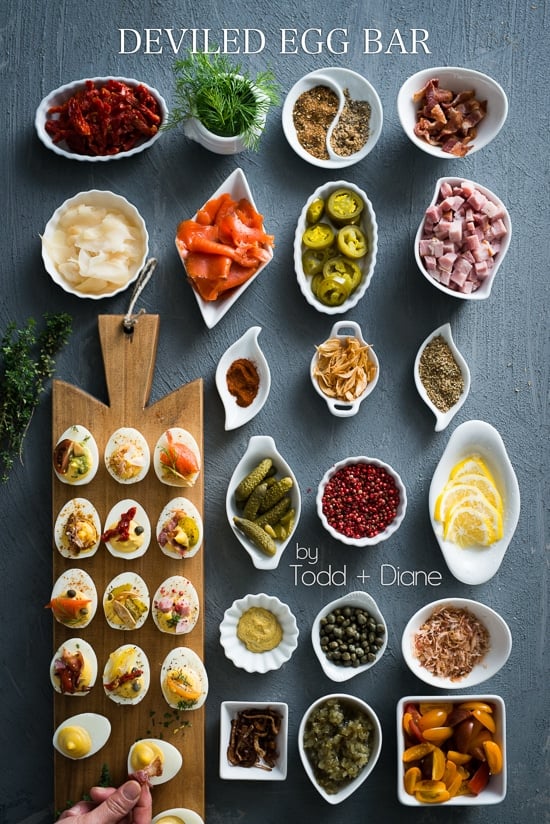 Hard-boiled eggs, mayonnaise, mustard, and colorful vegetables for deviled egg sailboats.