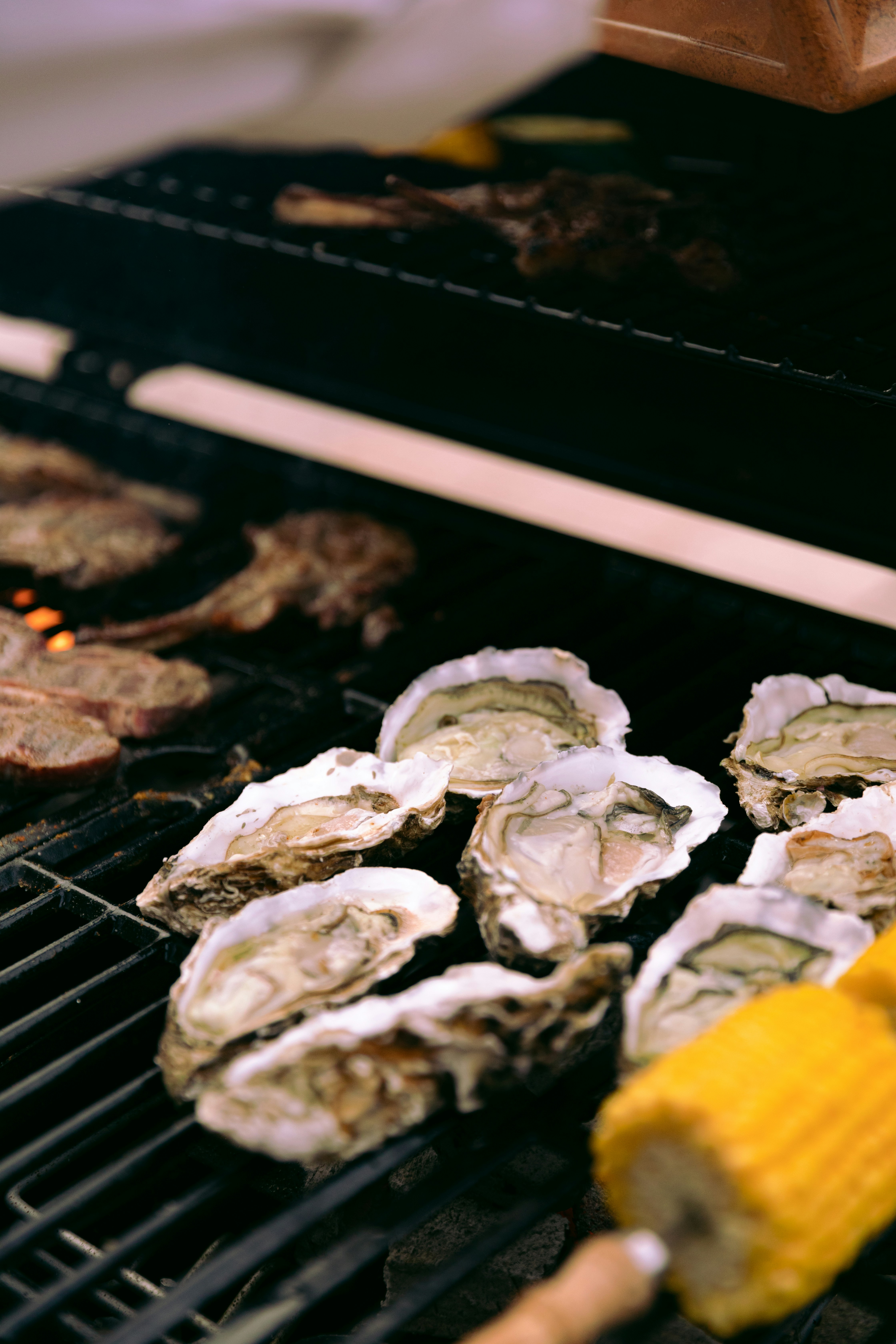 Smoky Barbecue-Grilled Oysters with Herb Butter