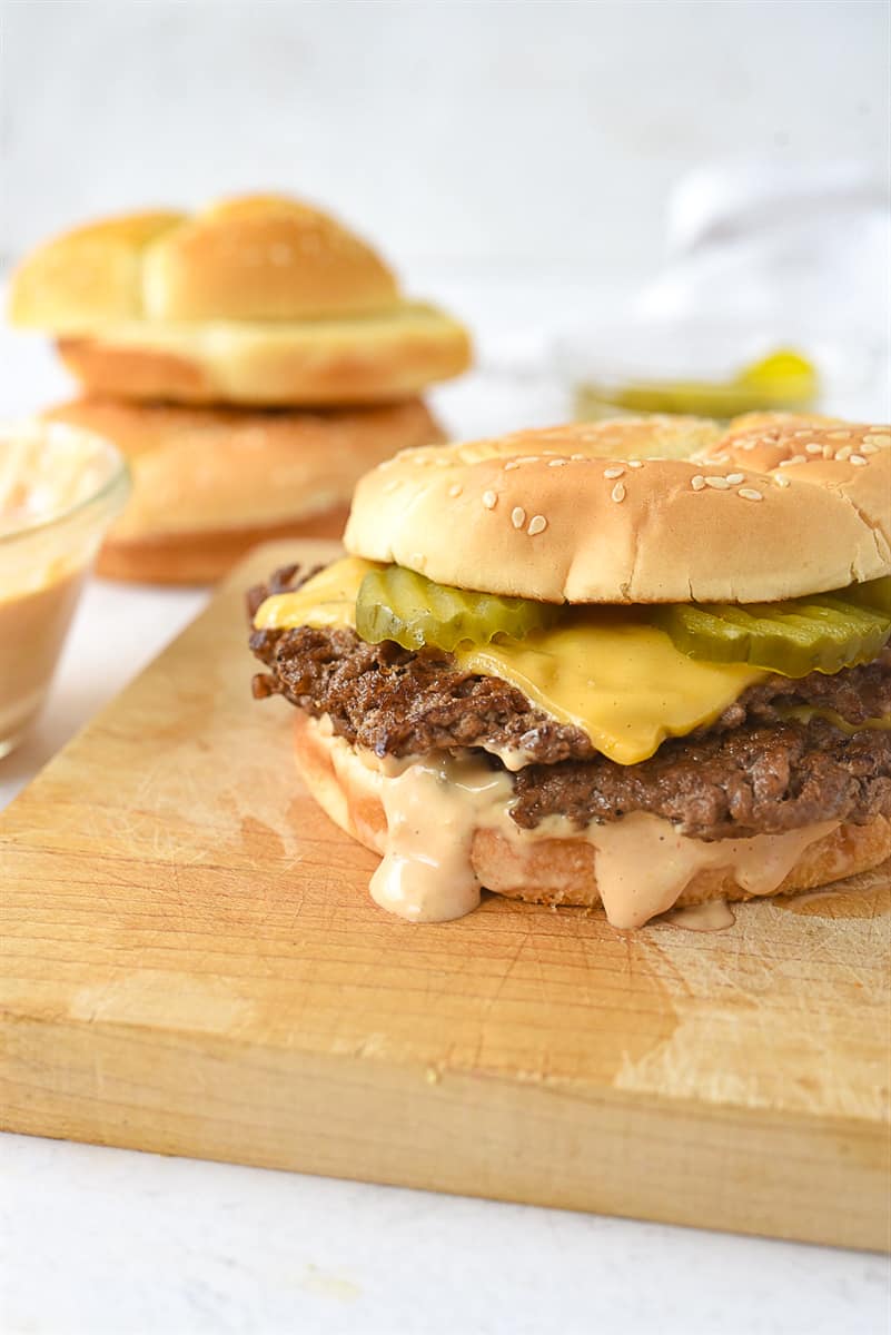 Griddle-Cooked Smash Burgers with Tangy Pickles