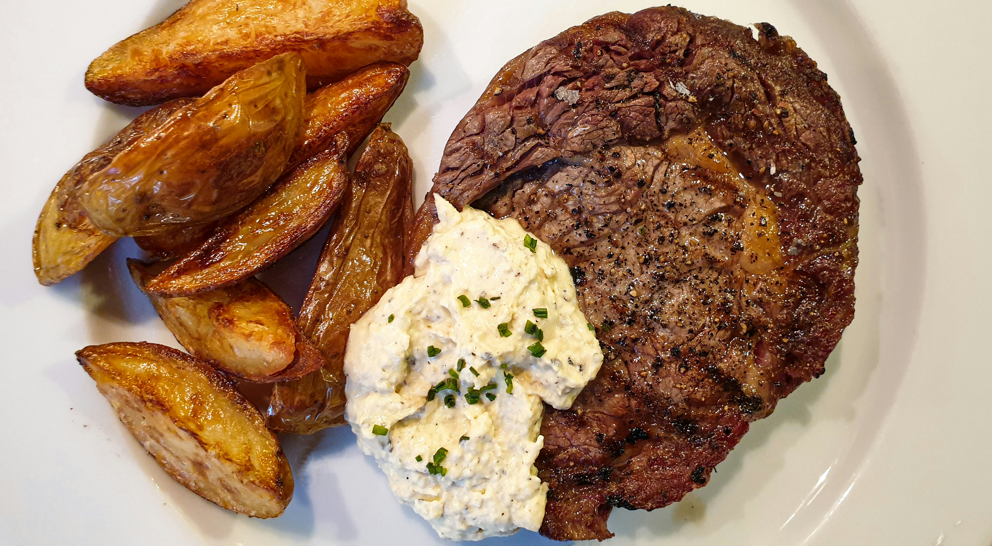 Juicy Grilled Steak with Crispy Home Fries and Creamy Horseradish Sauce