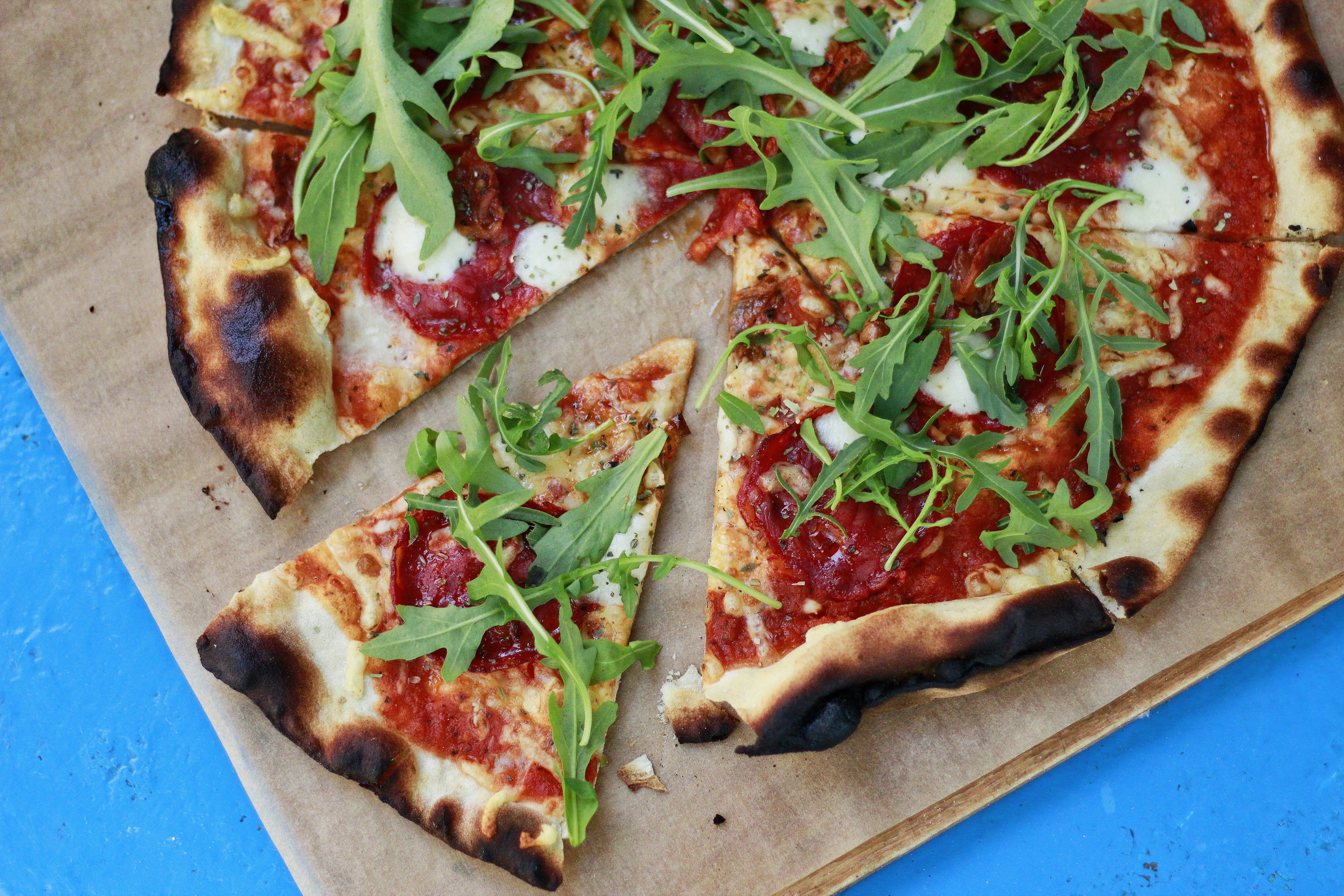 Crispy Wood Fired Thin Crust Pizza with Arugula and Chorizo